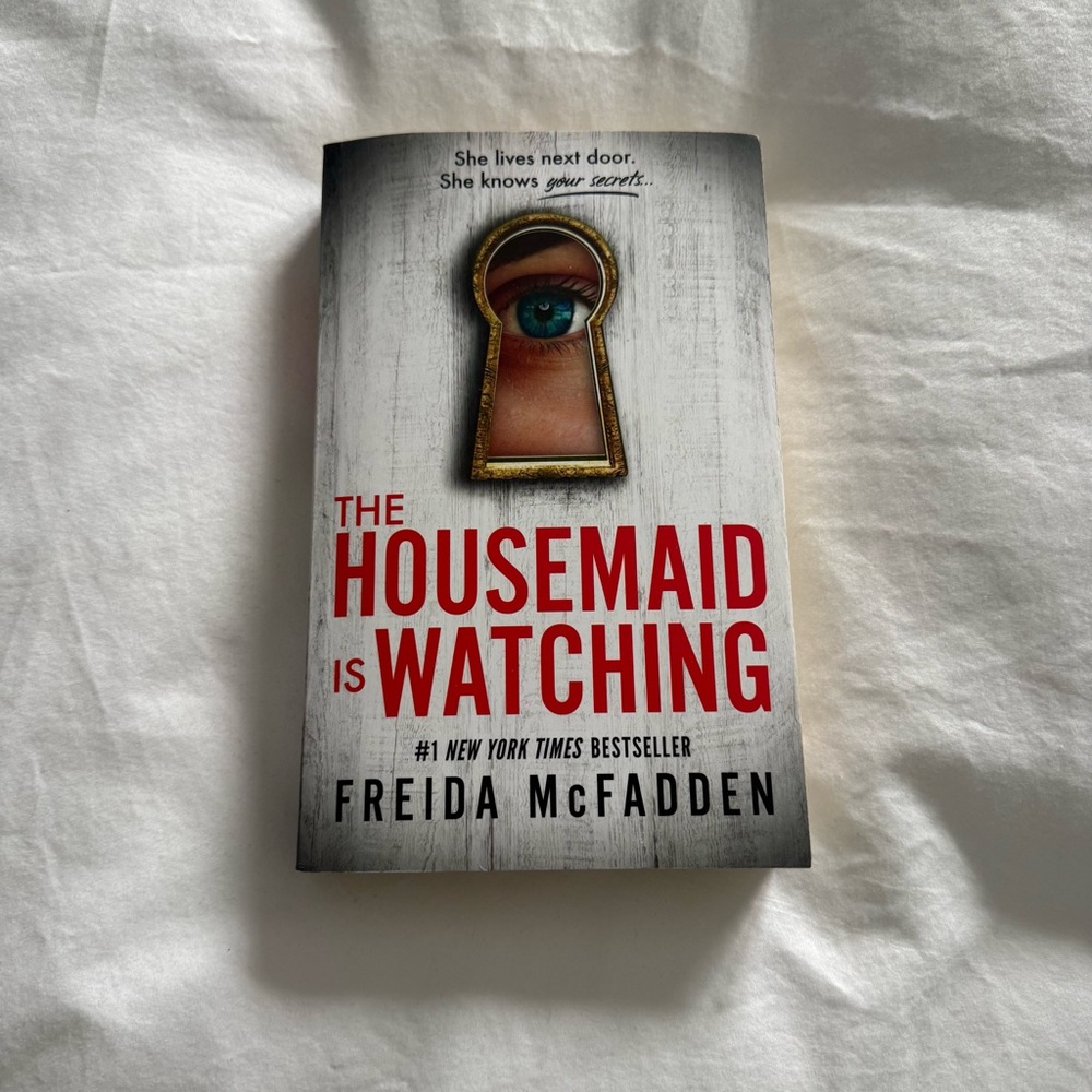 The Housemaid Is Watching by Freida McFadden Paperback | Psychological Thriller